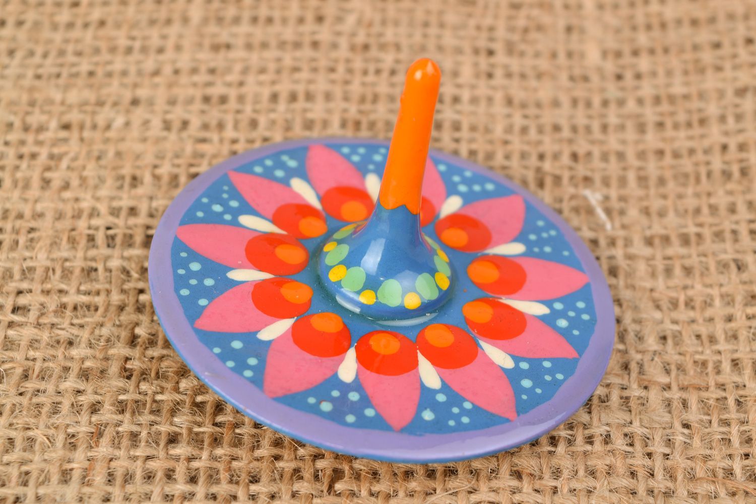 Handmade wooden spinning top toy with traditional Petrikivka painting for kids photo 1