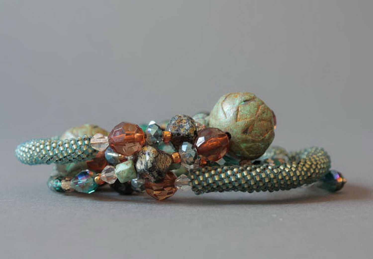 Three layers light pale green bead bracelet with decorative stones photo 1