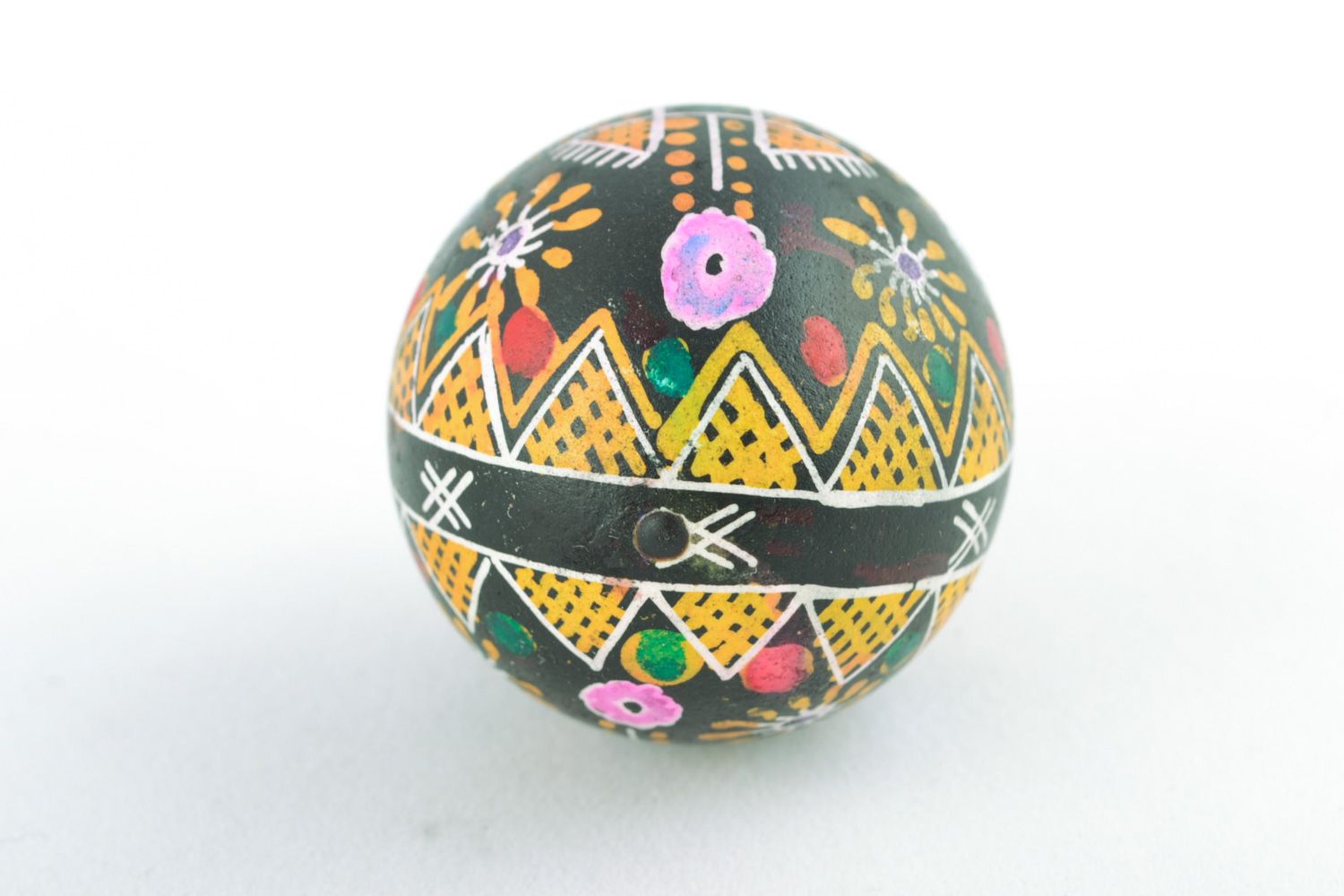 Handmade traditional Easter egg painted using wax technique for interior decor photo 5
