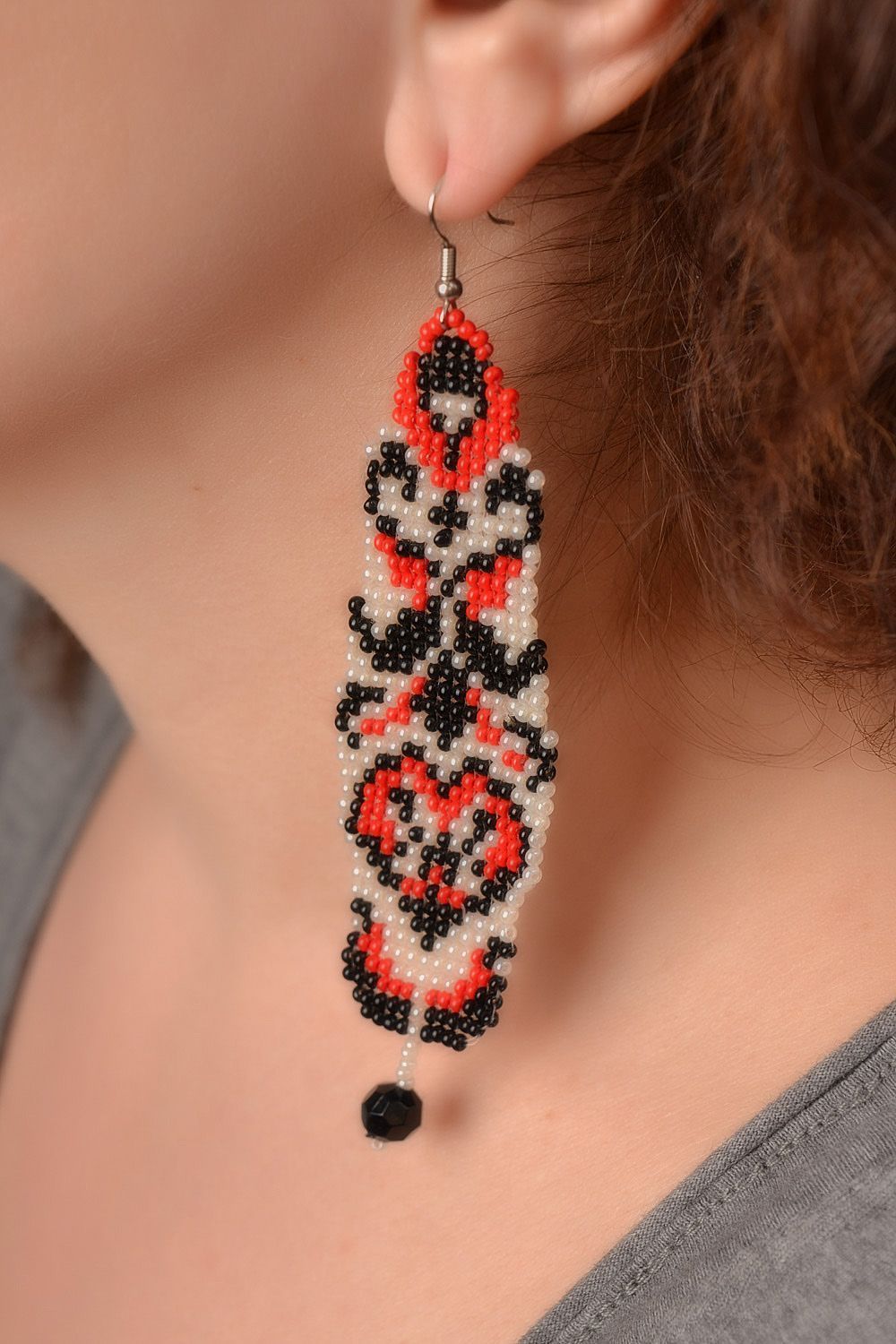 Handmade long dangling beaded earrings with ethnic motives black white and red photo 2