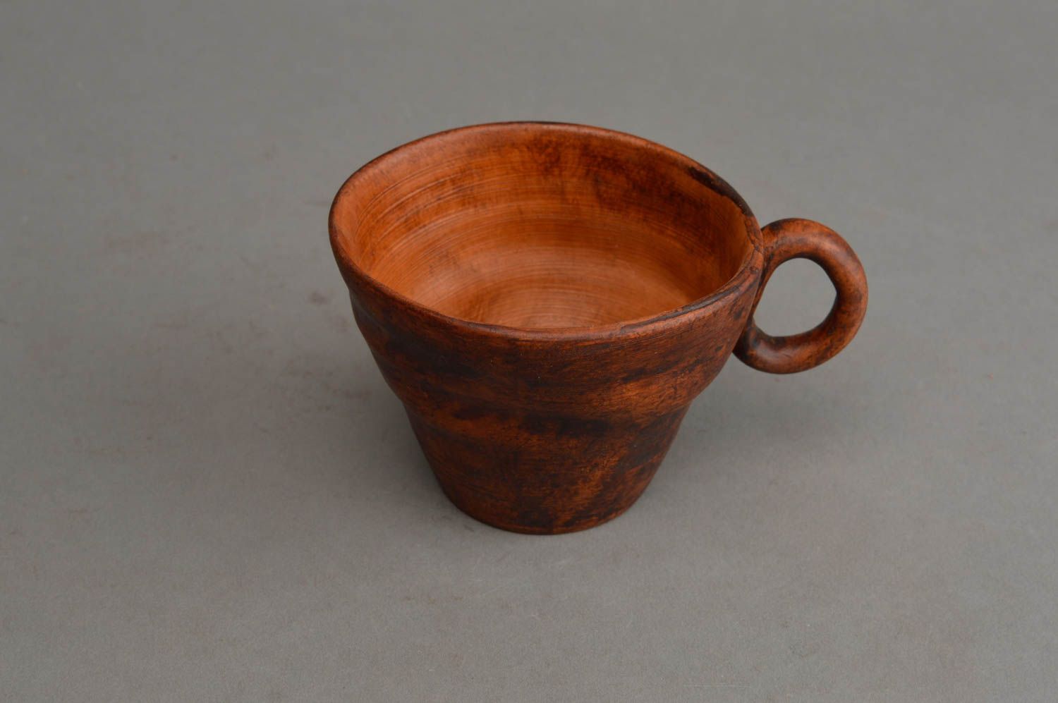 Clay drinking cup in a triangle shape with handle in brown natural color photo 3