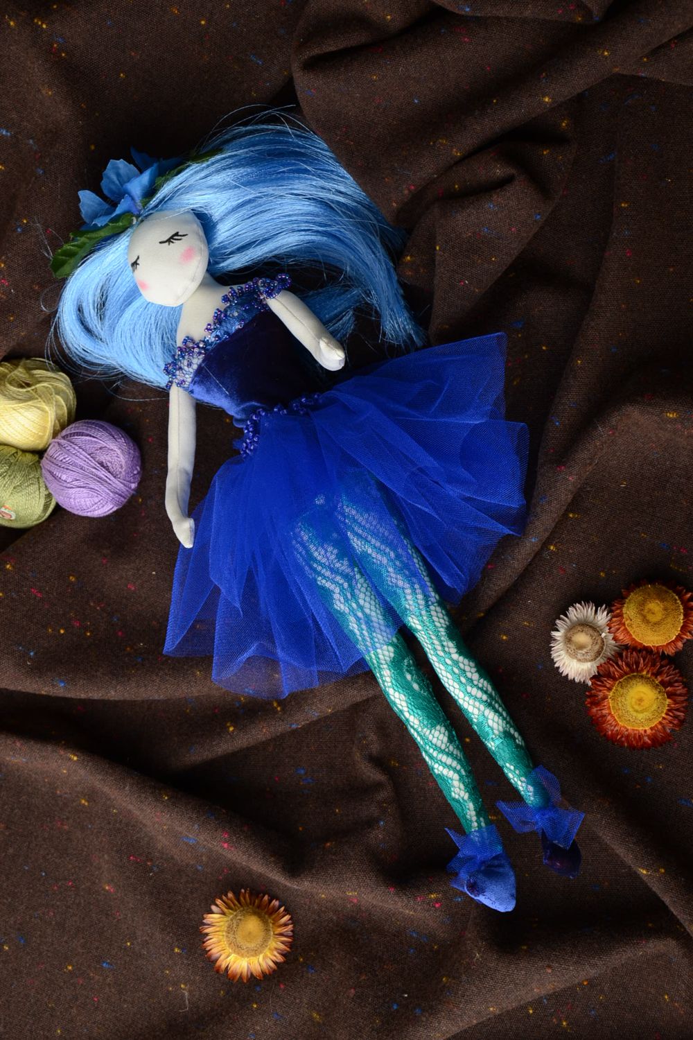 Handmade fabric doll in blue clothing photo 1
