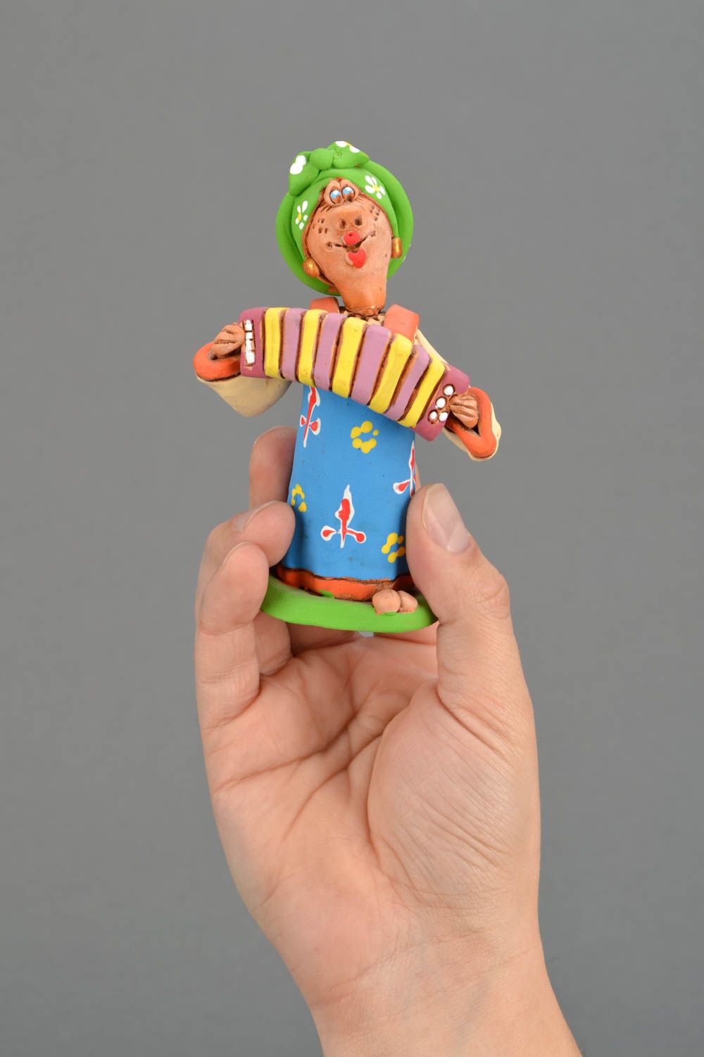 Bright clay figurine Cossack Woman Playing an Accordion photo 2