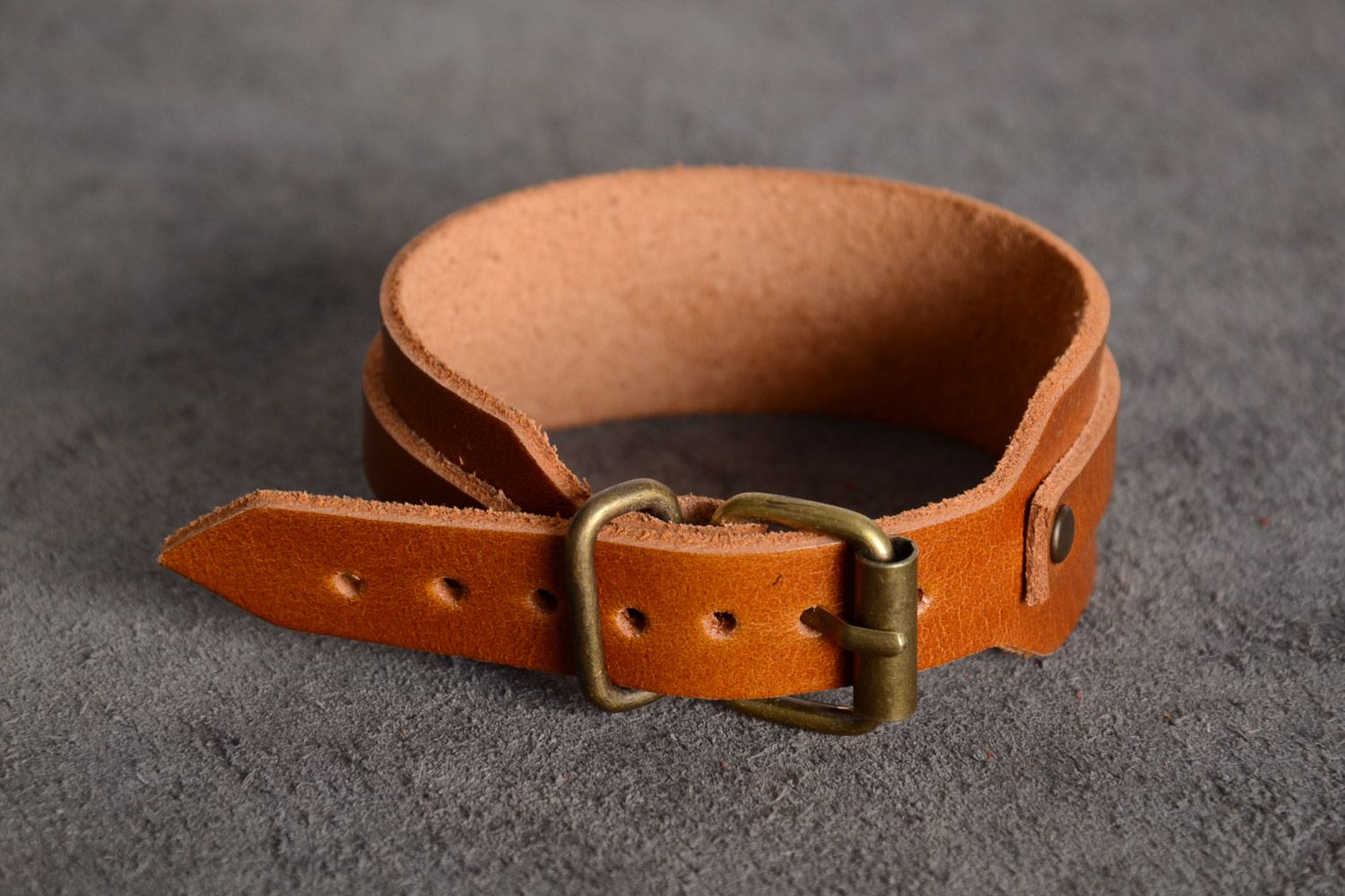 Handmade genuine leather wrist bracelet of brown color with buckle unisex photo 1