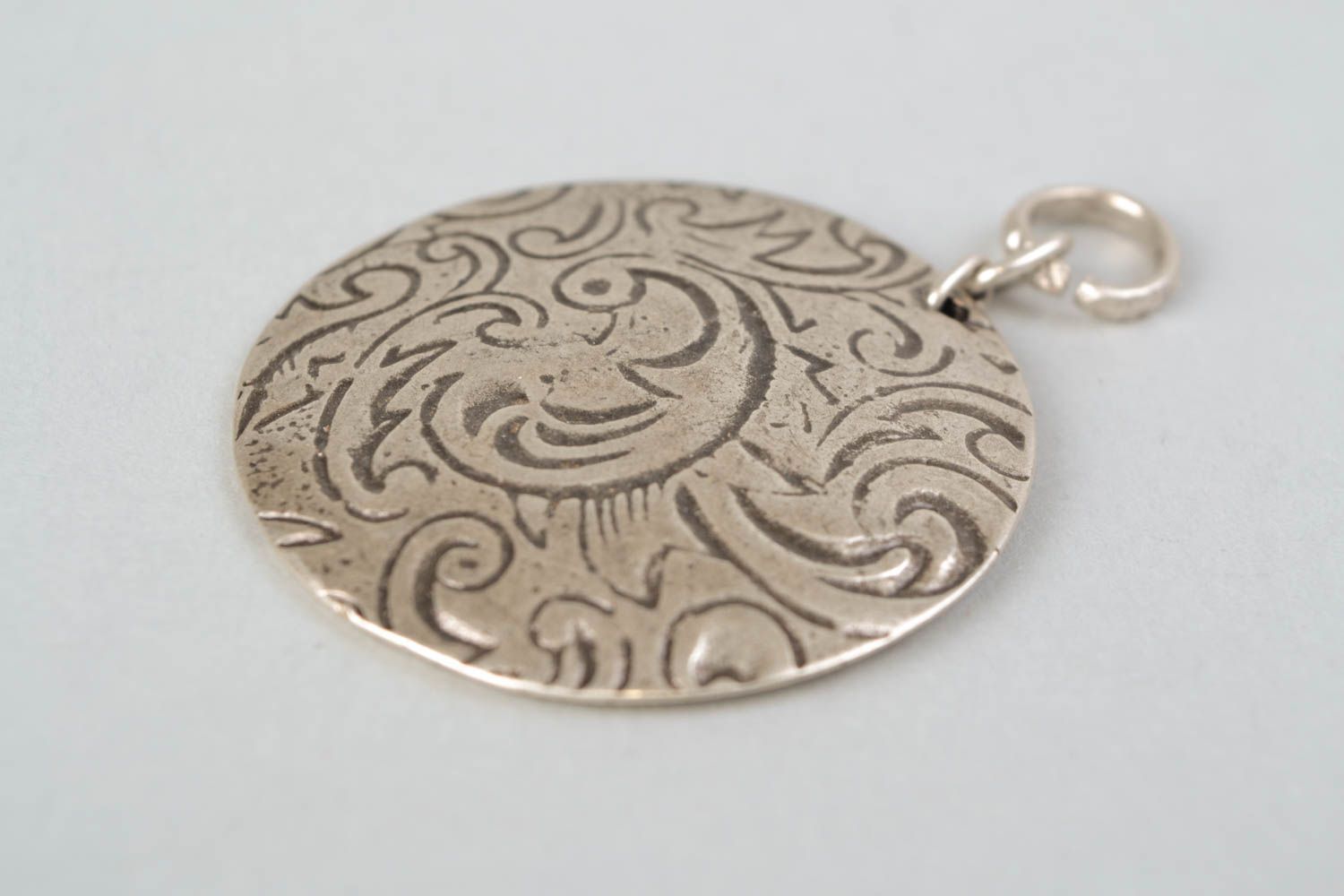 Metal pendant with pattern in the shape of firebird photo 4