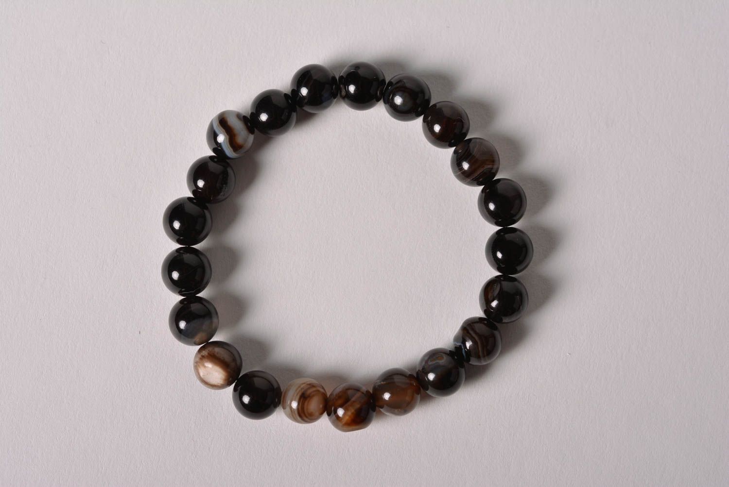 Handmade thin black agate beaded wrist bracelet of laconic design for women photo 4