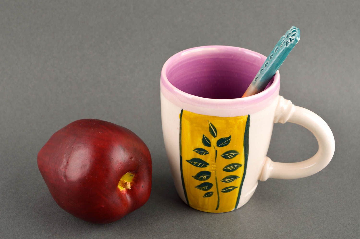 Glazed ceramic kids' drinking cup with ceramic spoon and bright pattern photo 1