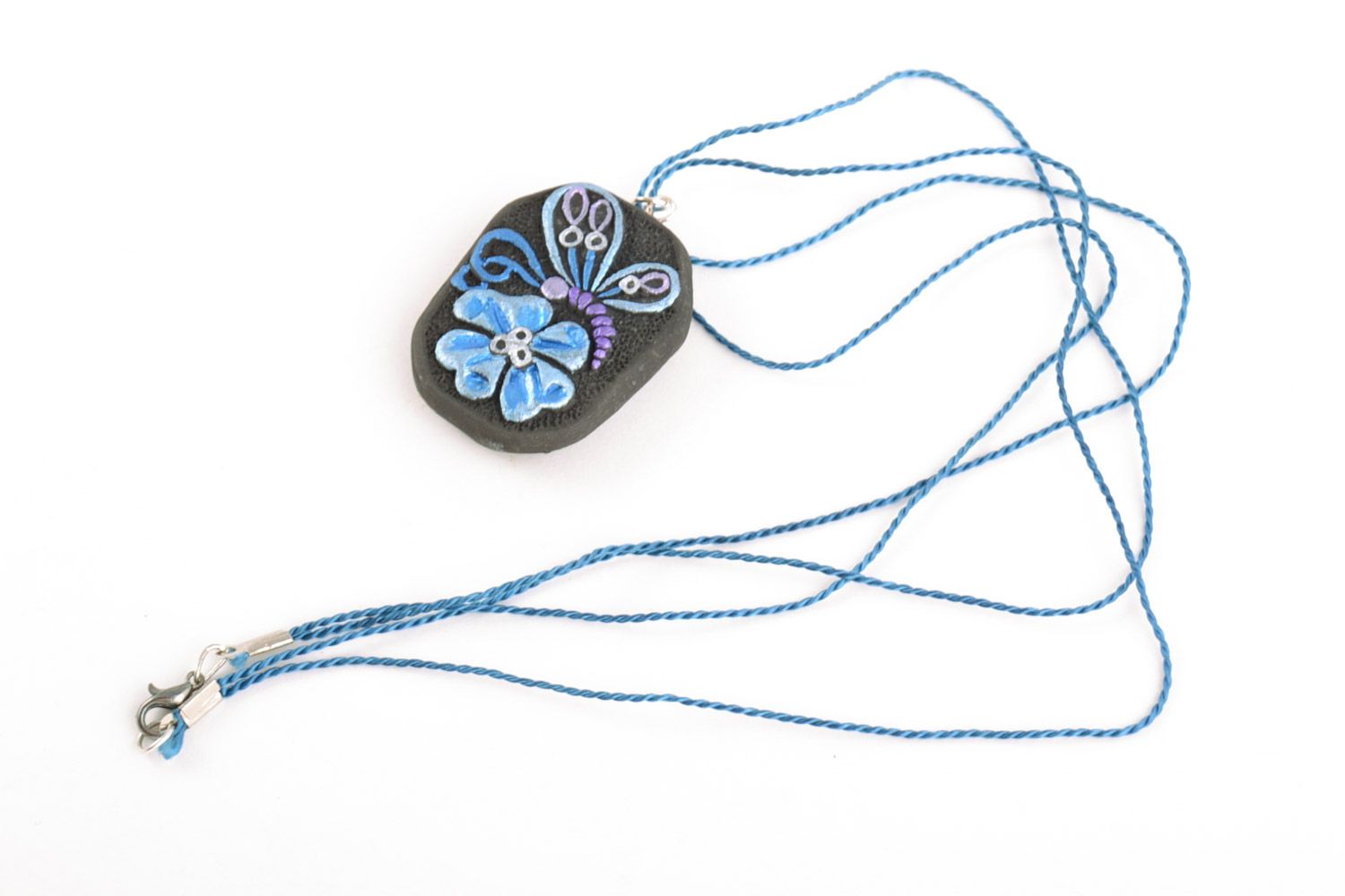 Pendentif en terre cuite peint de couleurs sur lacet fait main Papillon et fleur photo 4