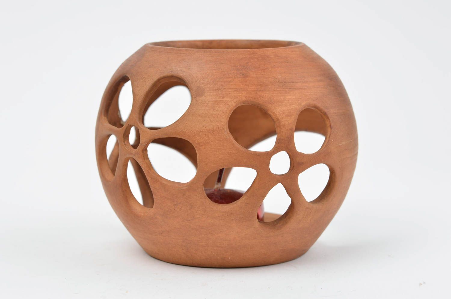 Bougeoir en céramique ajouré en forme de boule brun fait main pour une bougie photo 2