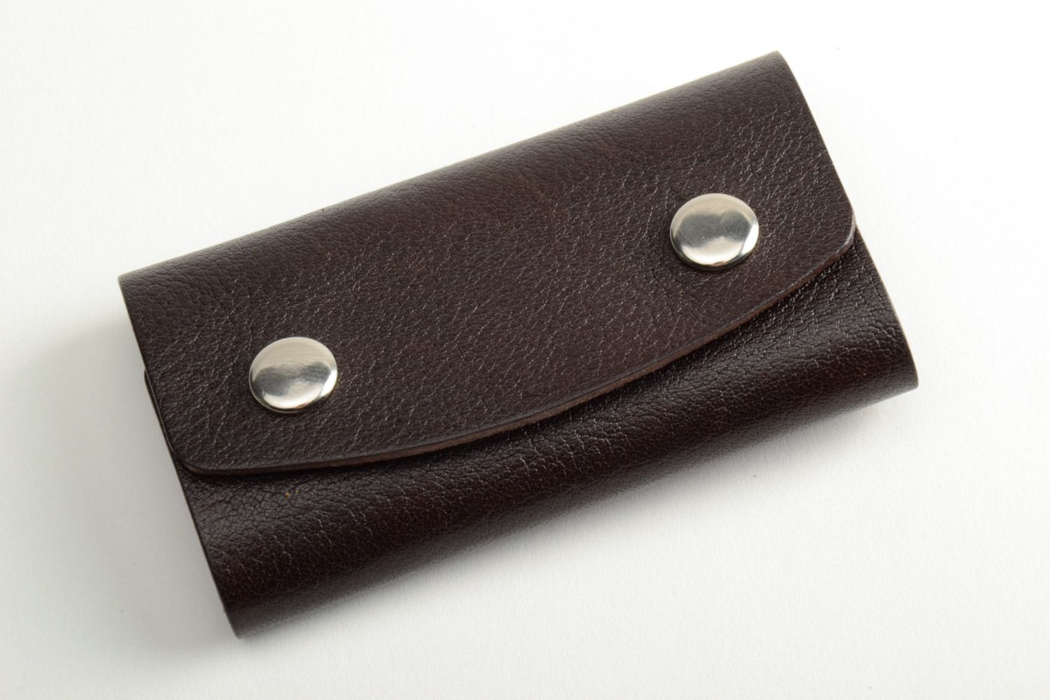 Handmade laconic dark brown genuine leather key case with metal studs  photo 2