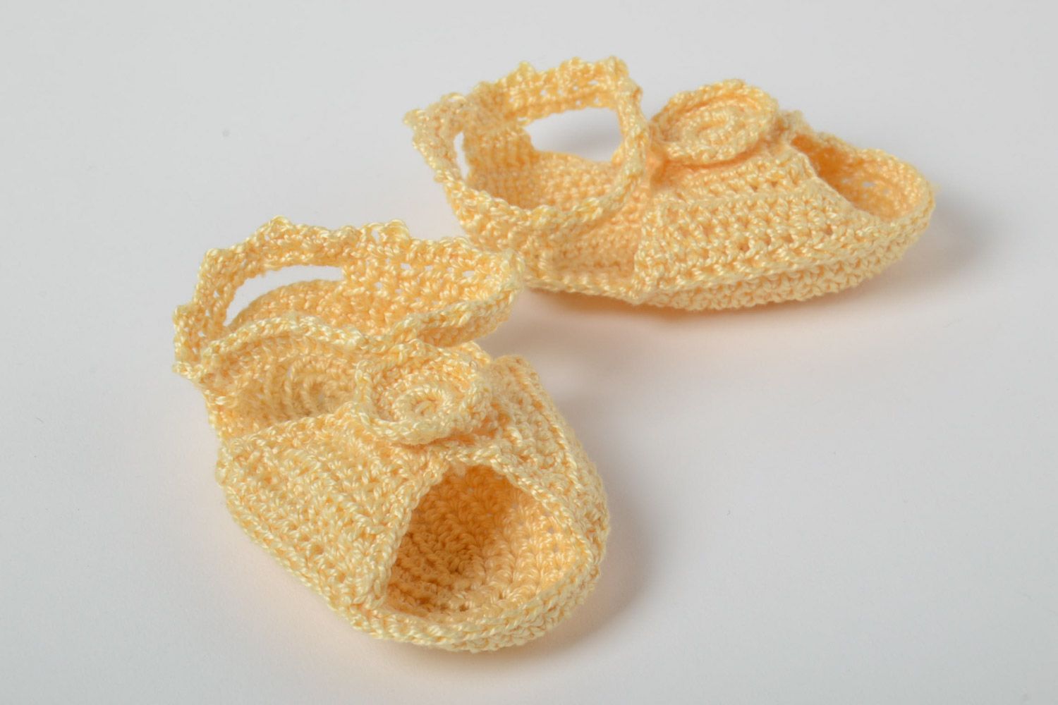 Handmade baby sandals crocheted of cotton threads of yellow color for little girl photo 2
