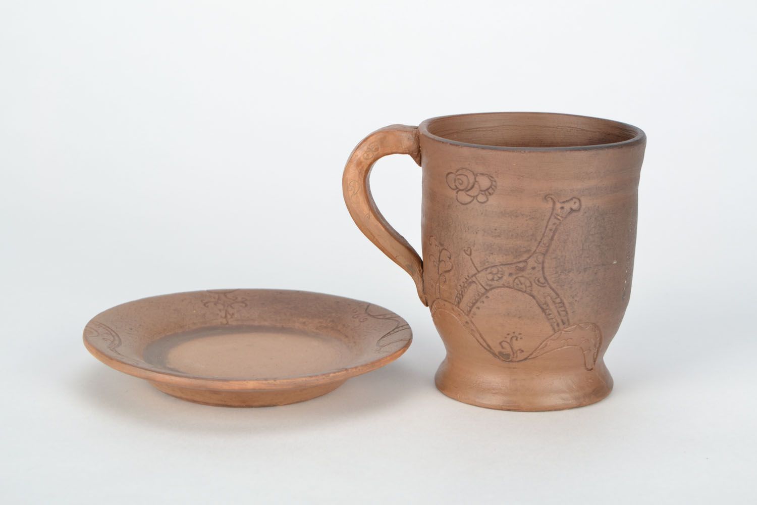 Natural clay drinking cup for a kid with handle and giraffe pattern photo 4