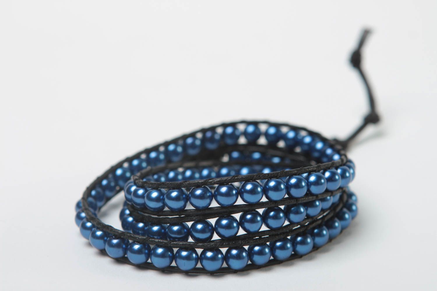 Bracelet tressé fait main Bijoux artisanaux noir et bleu Accessoire femme mode photo 1