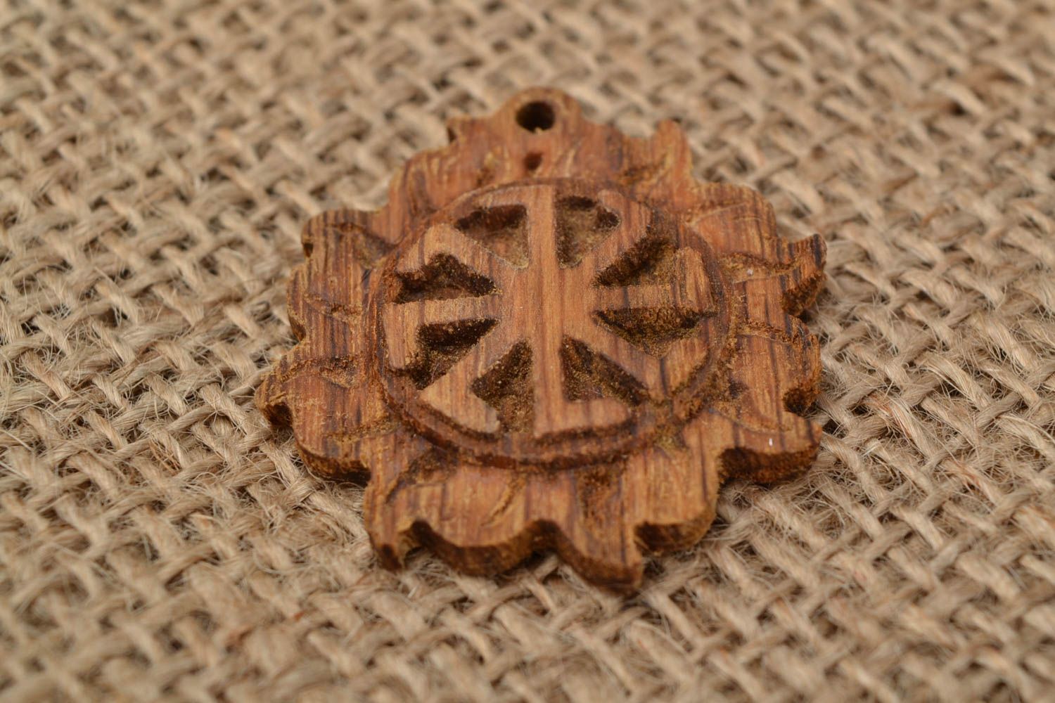 Slavonic handmade round pendant amulet made of wood Kolovrat in the Sun photo 1