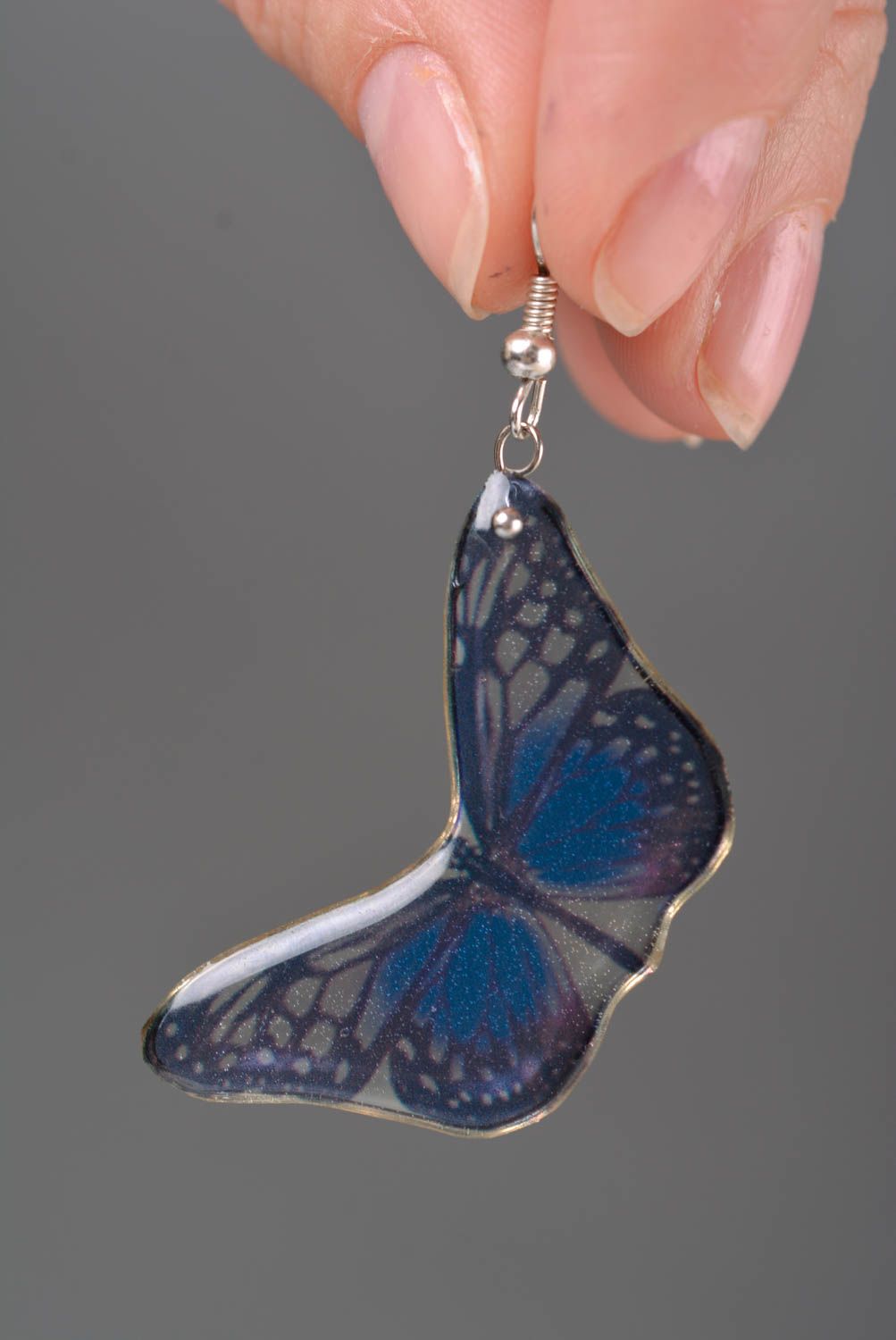 Handmade elegant designer dangling earrings blue butterflies in epoxy resin photo 2