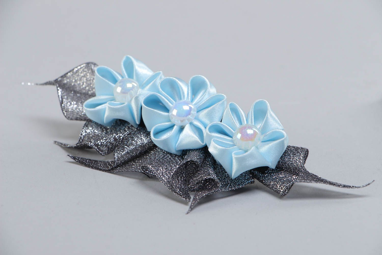 Handmade decorative hair clip with three blue satin ribbon kanzashi flowers photo 3