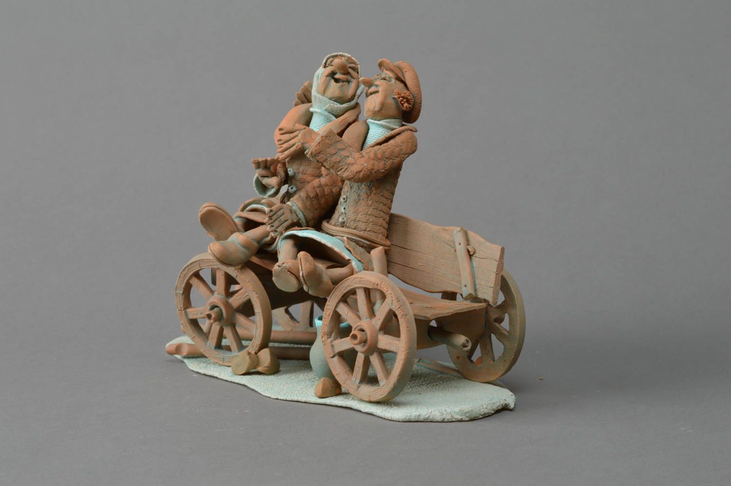 Handmade decorative unusual clay figurine Cheerful Couple in Cart photo 3