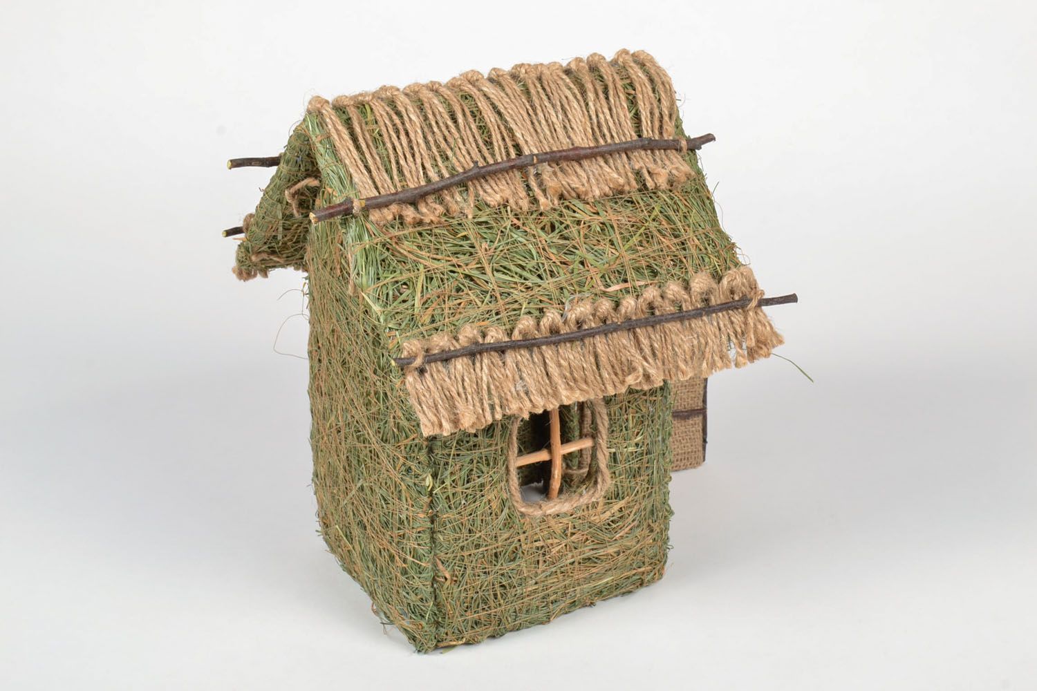 Decorative house made of forest grass photo 3