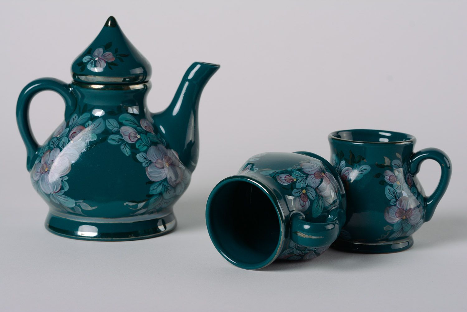 Decorative elegant dark blue porcelain teapot and two cups with flower pattern  photo 4