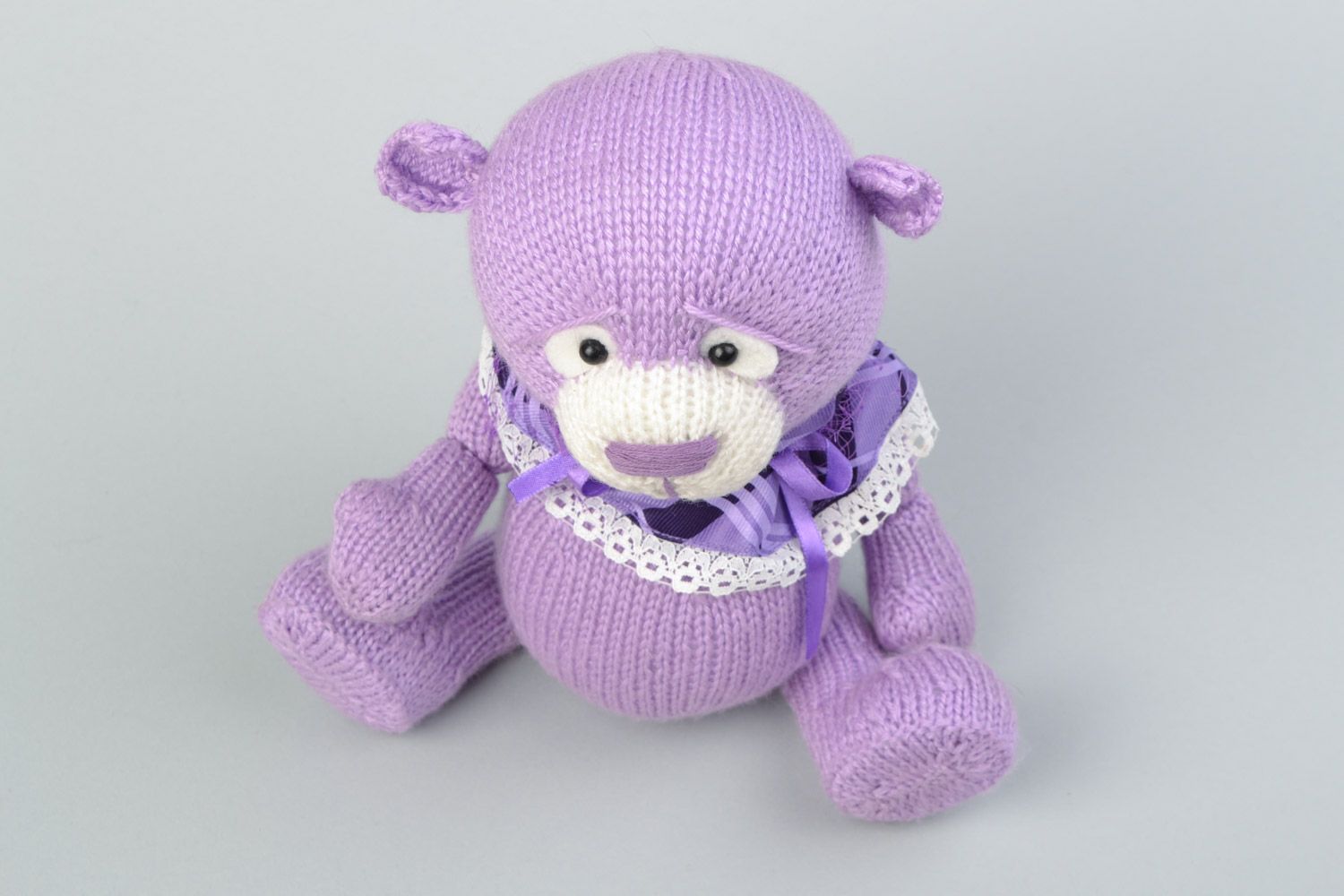 Handmade decorative crocheted purple bear toy with a bow for children photo 3
