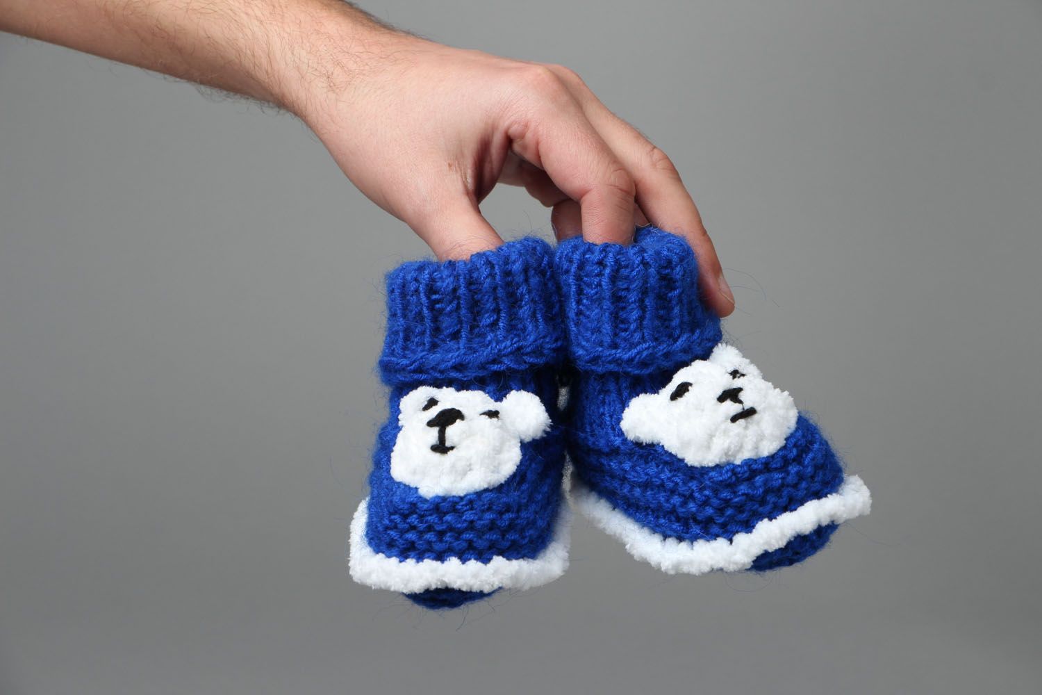 Hand knitted blue baby shoes photo 4