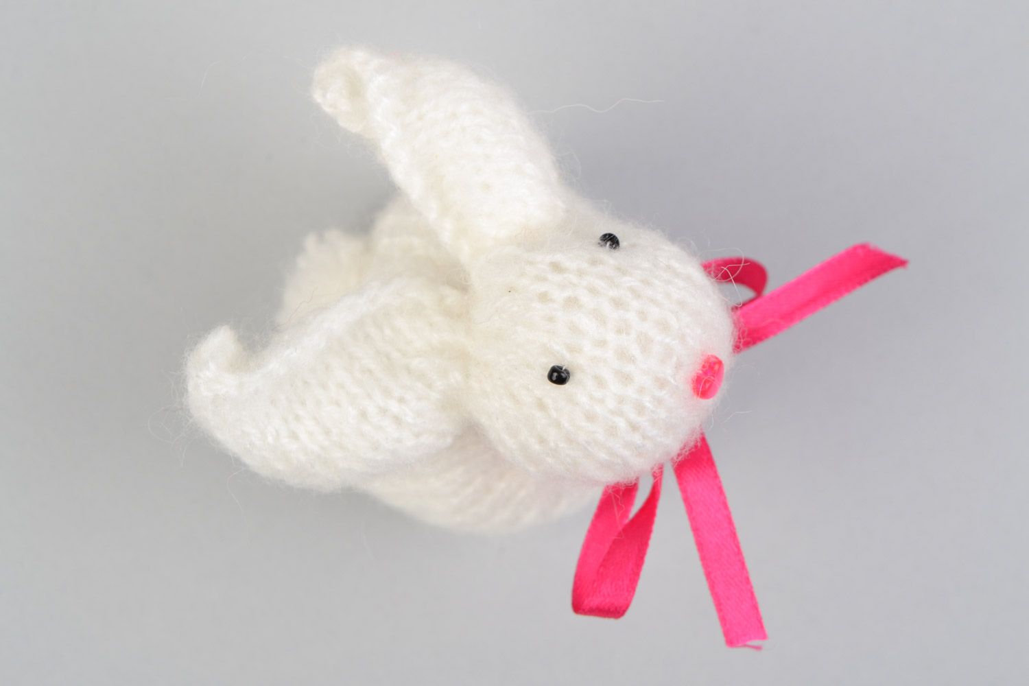 Handmade soft toy knitted of angora wool in the shape of white rabbit with pink bow photo 3