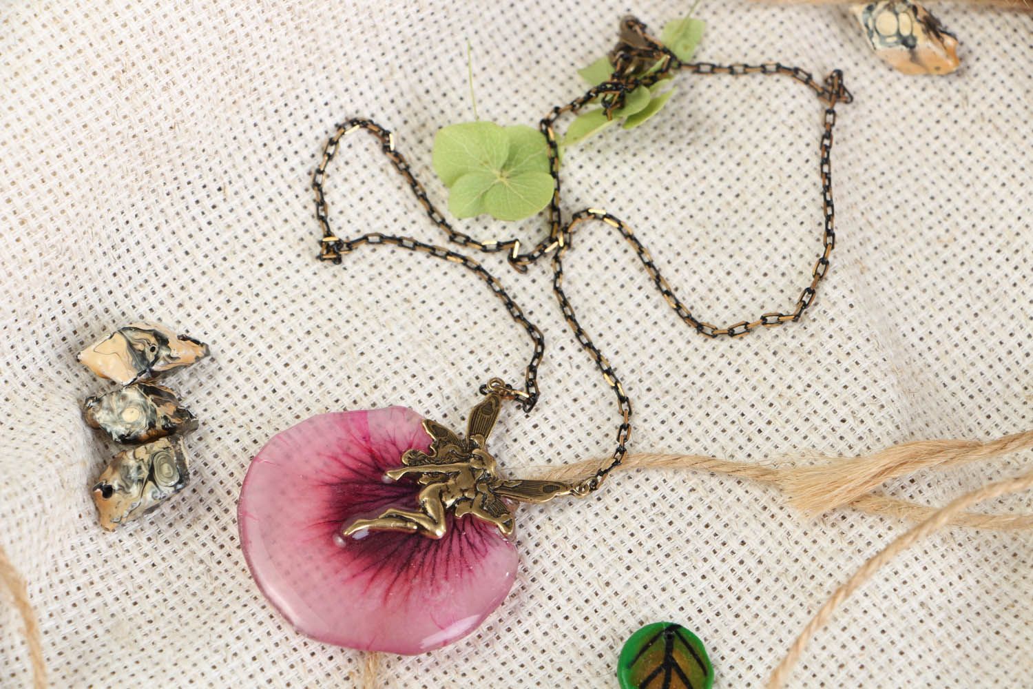 Pendant on a long chain with natural flower photo 1