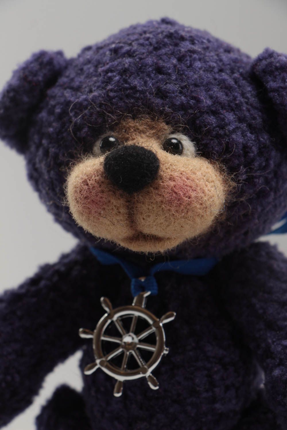 Handmade designer soft toy crocheted of woolen threads blue bear with charm photo 3