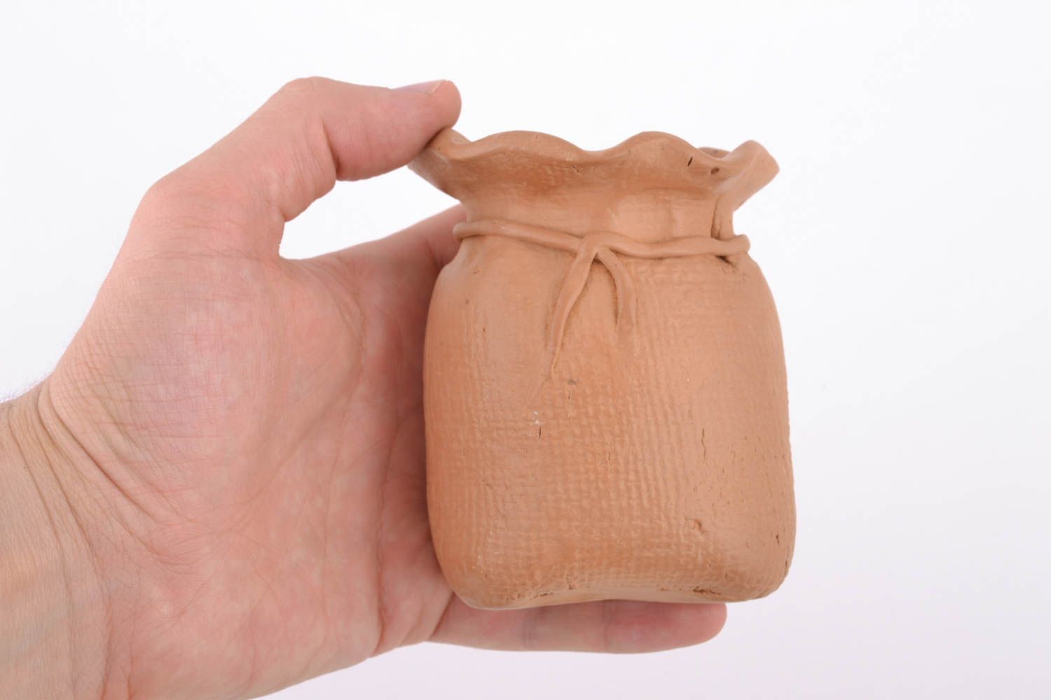 Sucrier d'argile original en forme de sachet fait main marron style ethnique photo 2