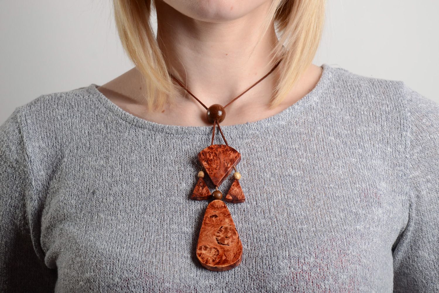 Handmade designer carved wooden neck pendant with charms and cord for women photo 2