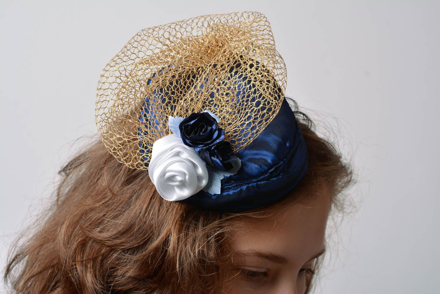 Handmade small unusual blue satin cocktail hat with flowers and veil for ladies photo 3