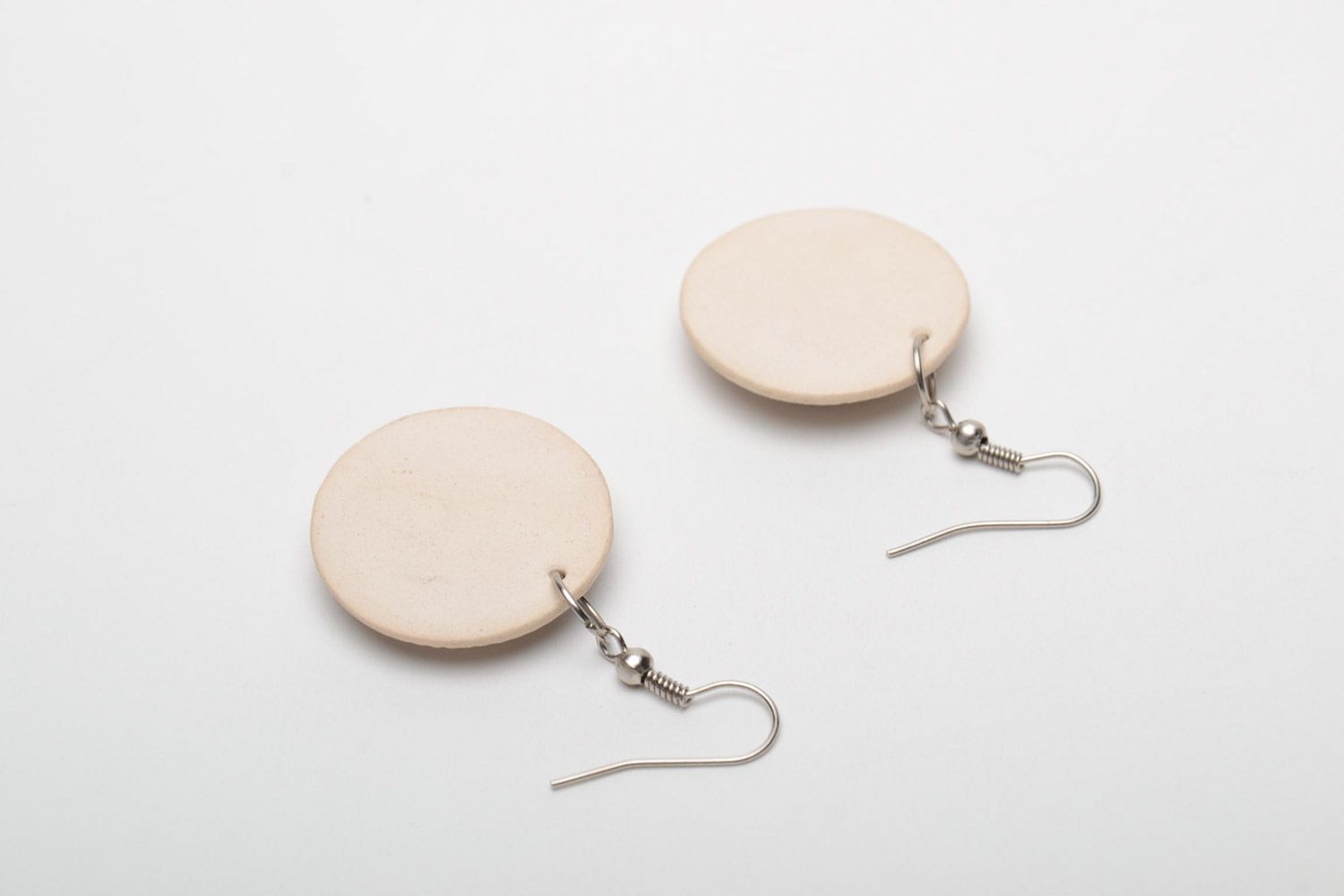 Small handmade beige round ceramic earrings in ethnic style for women photo 4