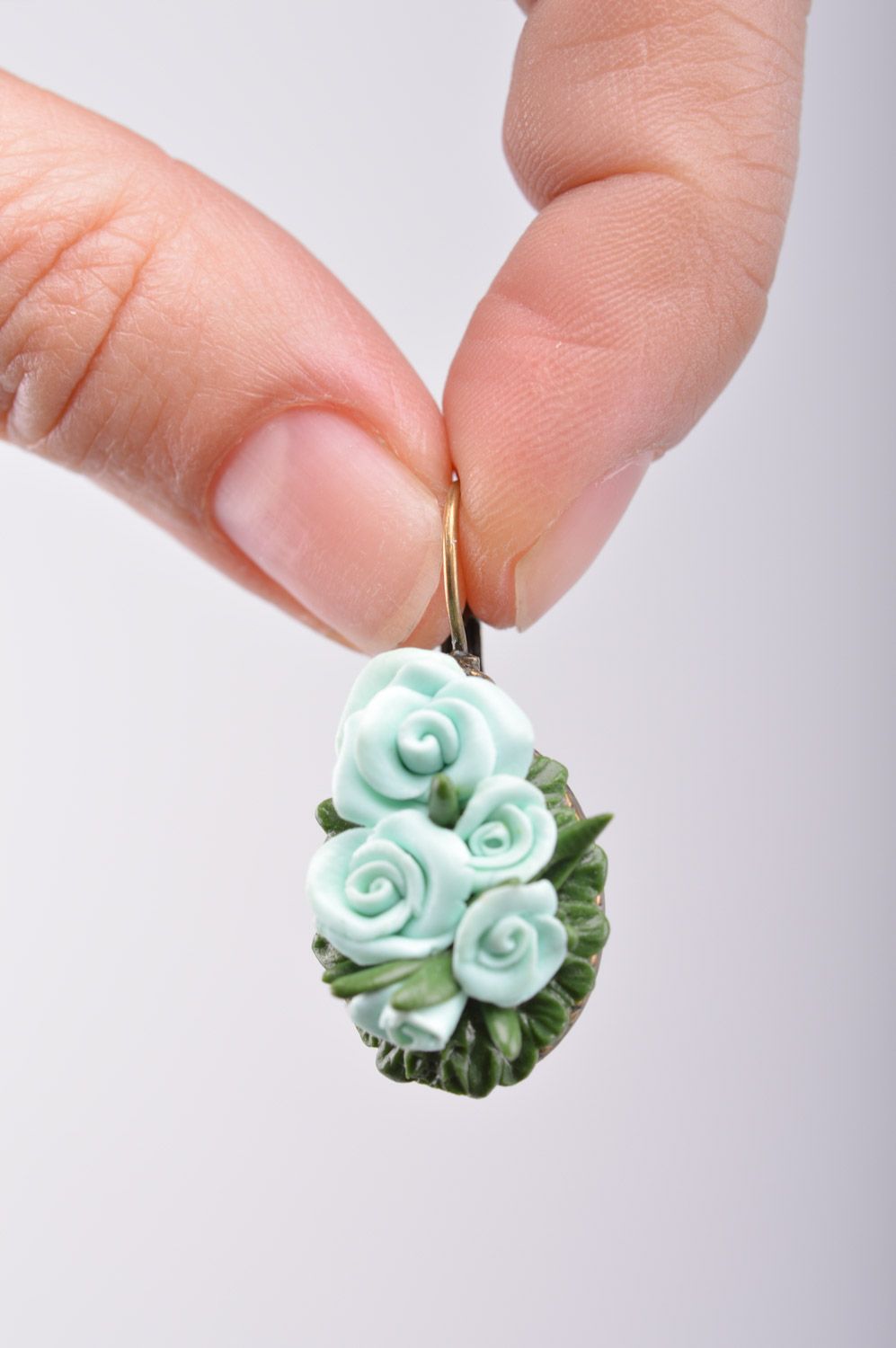 Elegant handmade polymer clay flower earrings of mint color photo 1