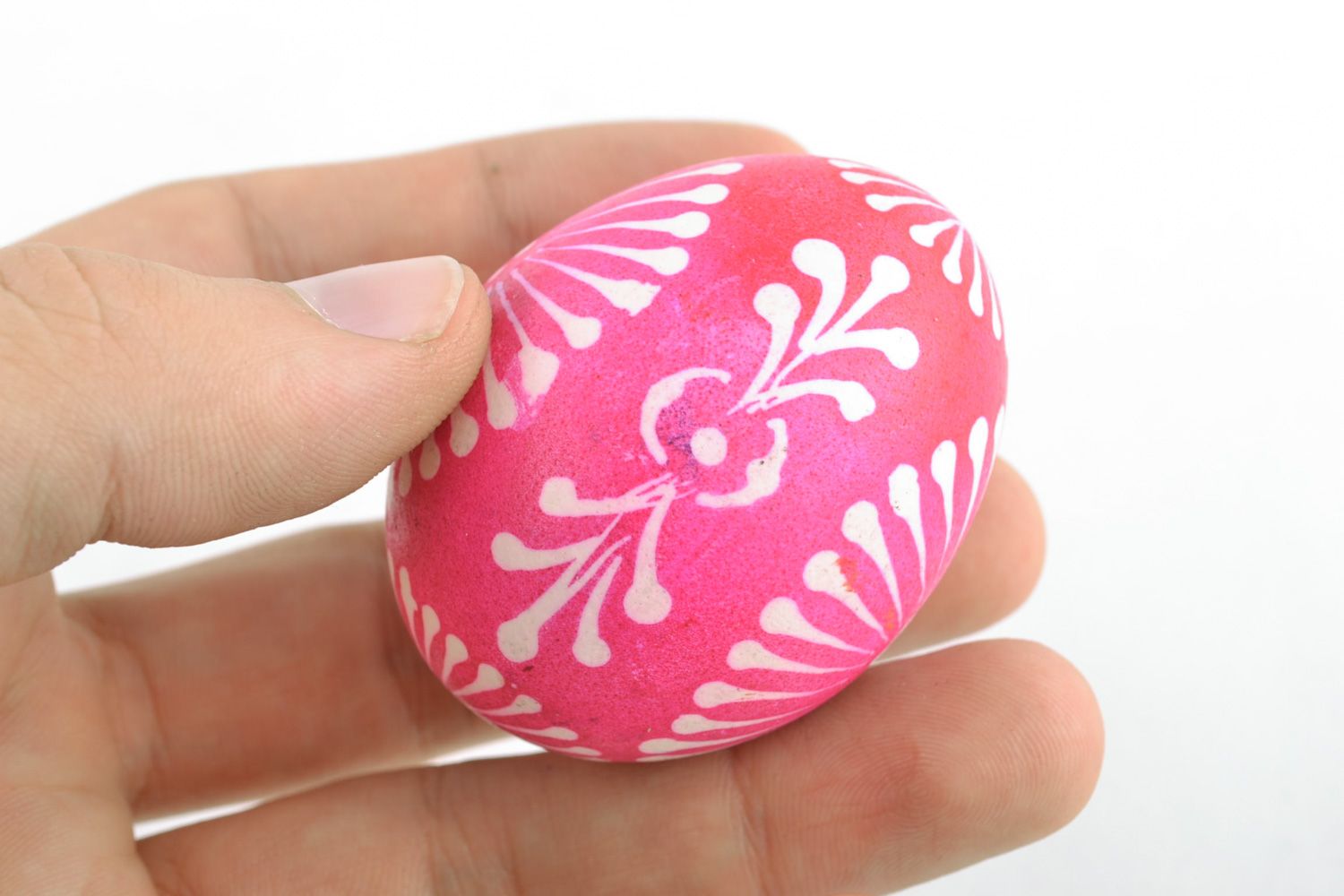 Bright pink Easter egg painted with melted wax and aniline dyes for home decor photo 2