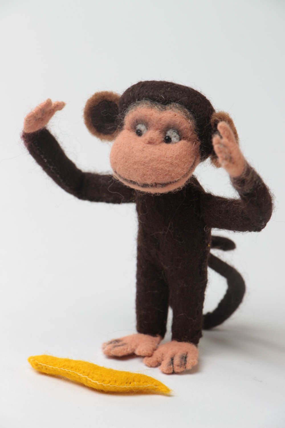 Handmade small designer woolen soft toy charming monkey with banana photo 2