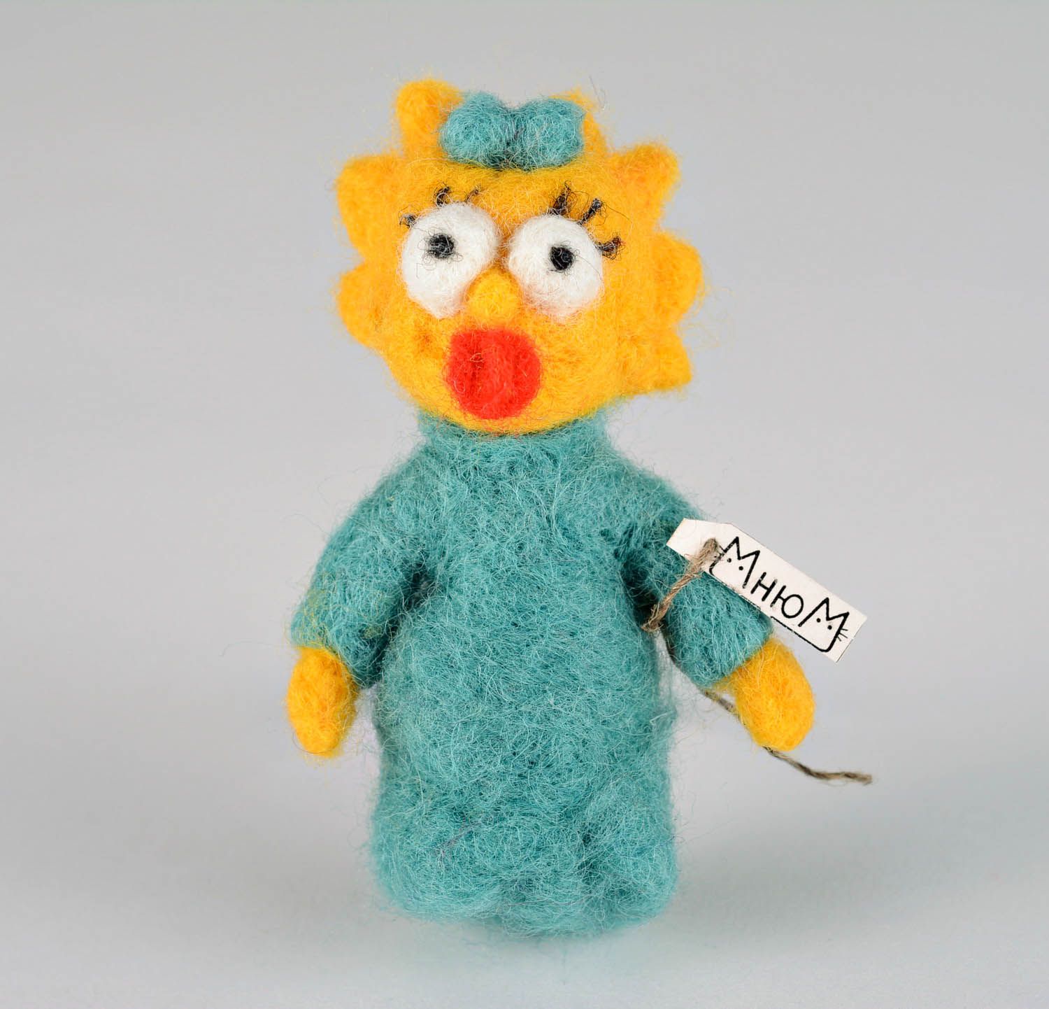 Toy made of wool using felting technique photo 1