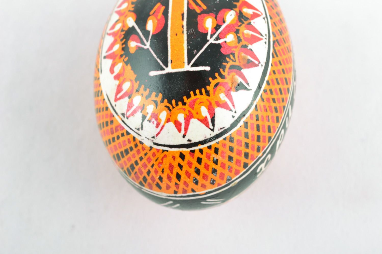 Beautiful handmade Easter egg pysanka with traditional painting made with hot wax photo 4