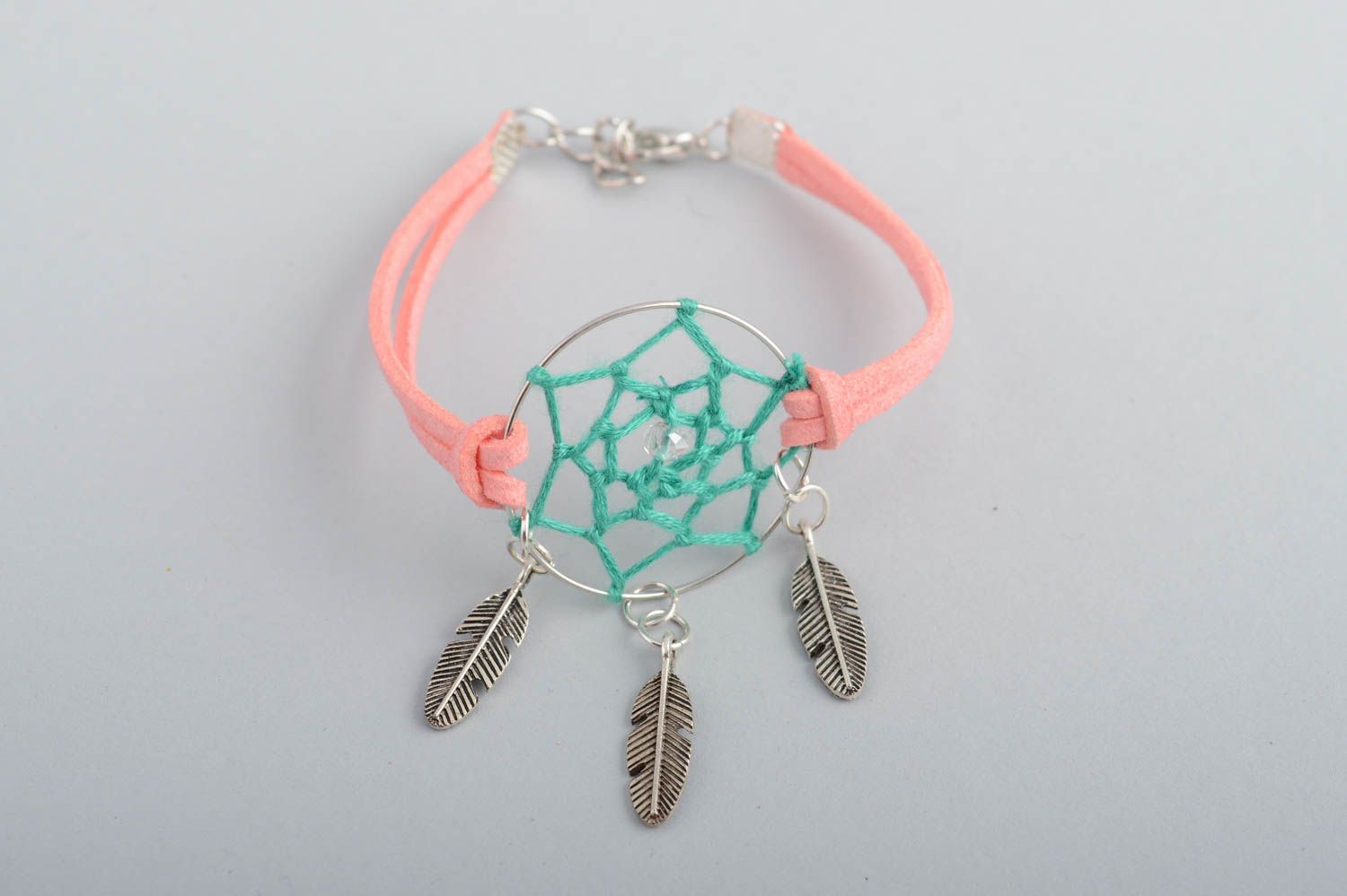 Handmade pink faux suede cord wrist bracelet with dreamcatcher amulet and charms photo 3