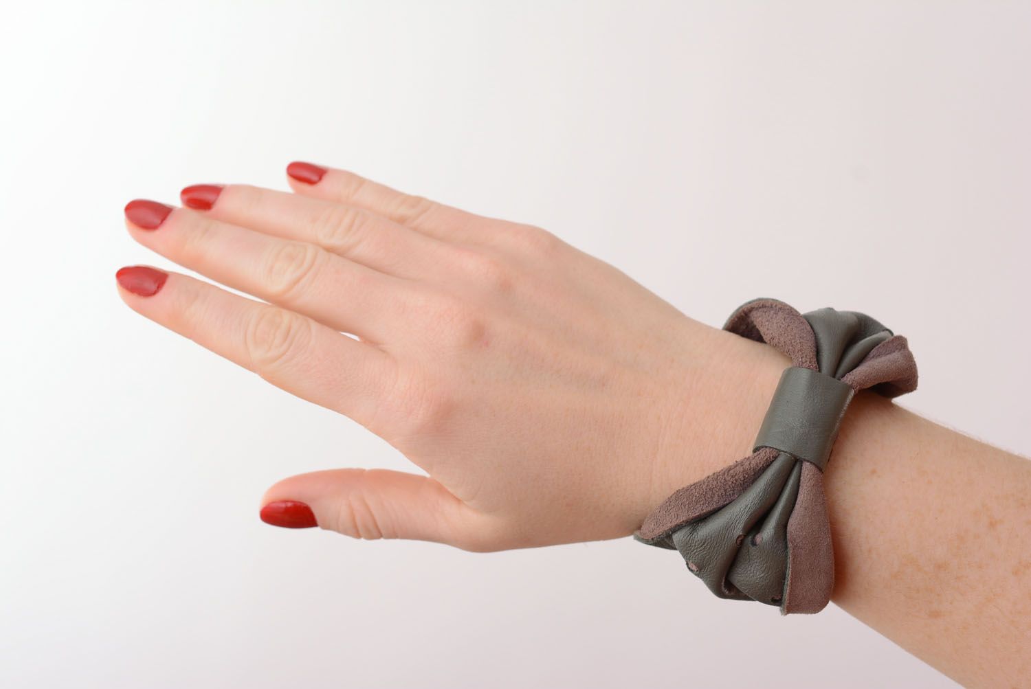 Bracelet noeud en cuir naturel fait main photo 1