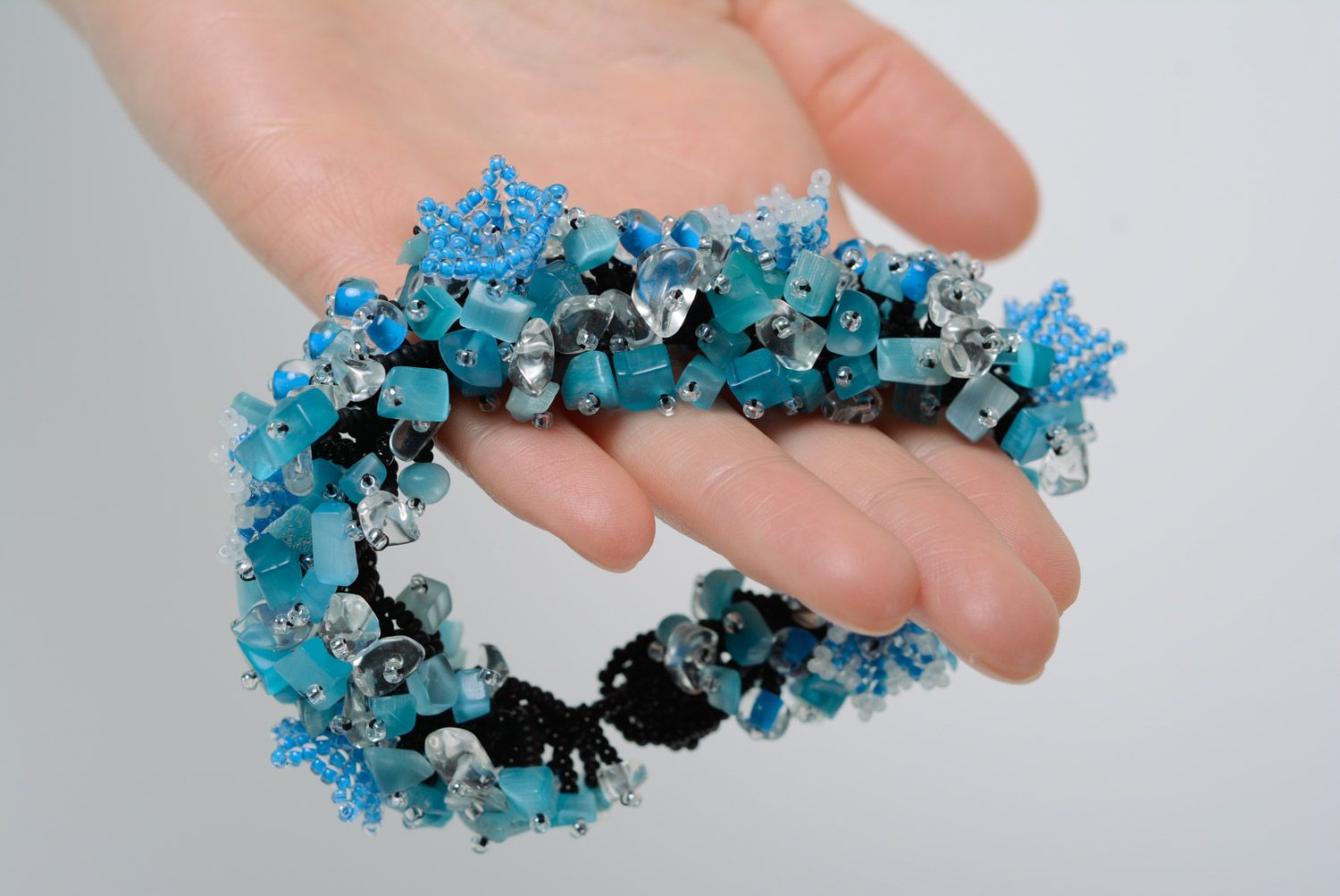 Handmade designer wrist bracelet woven of black and blue beads for women photo 2