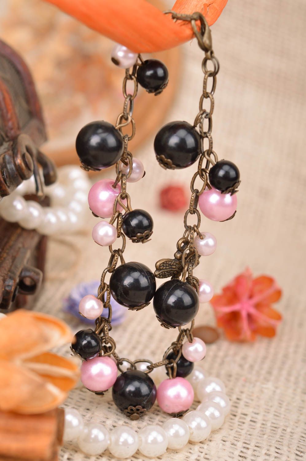 Handmade designer women's metal chain wrist bracelet with black and pink beads  photo 1