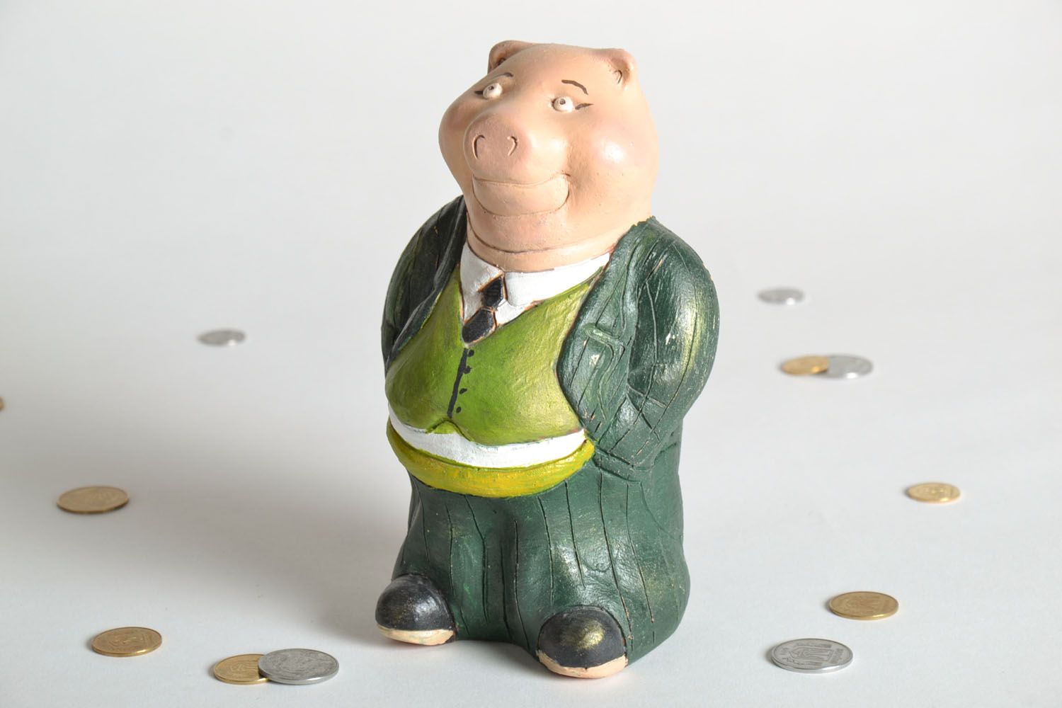 Clay money box in the shape of the pig banker photo 1