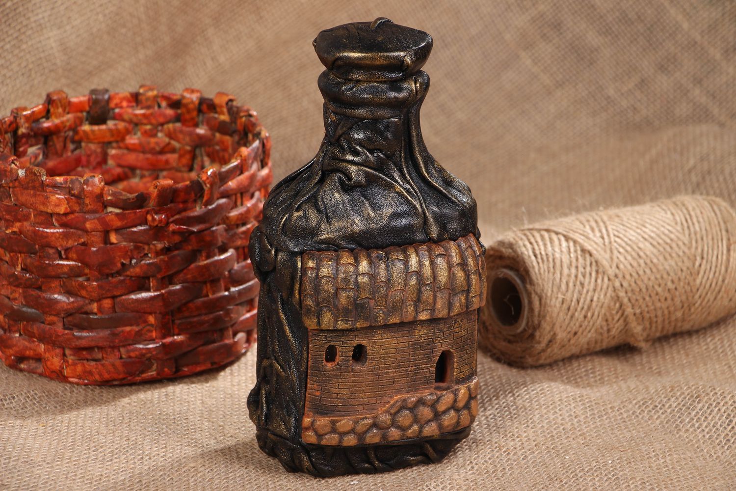 Handmade decorative bottle with leather and clay photo 5