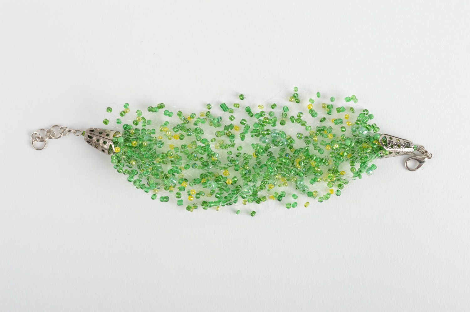 Handmade airy green wrist bangle bracelet crocheted of light green beads and fishing line  photo 2