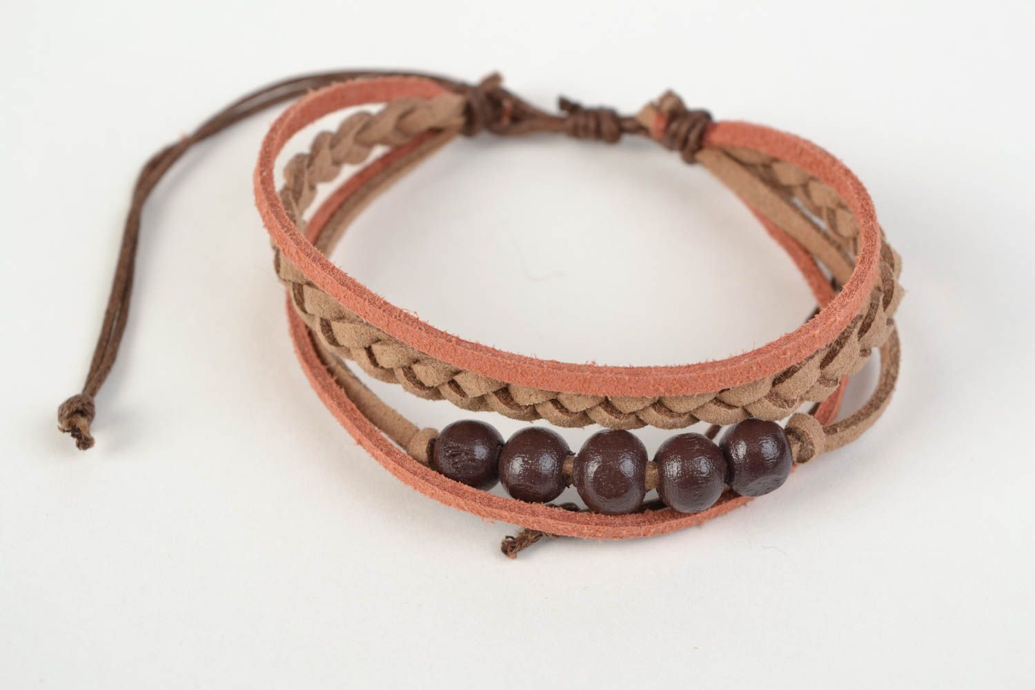 Handcrafted unique bracelet made of chamois-leather with entwined brown beads photo 3