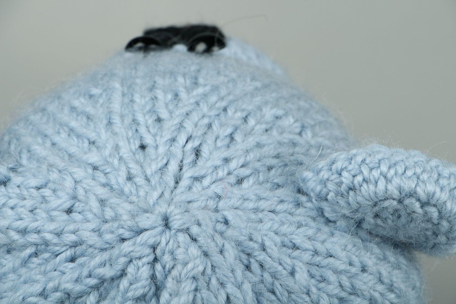 Knitted earflap hat made of semi-wool photo 4