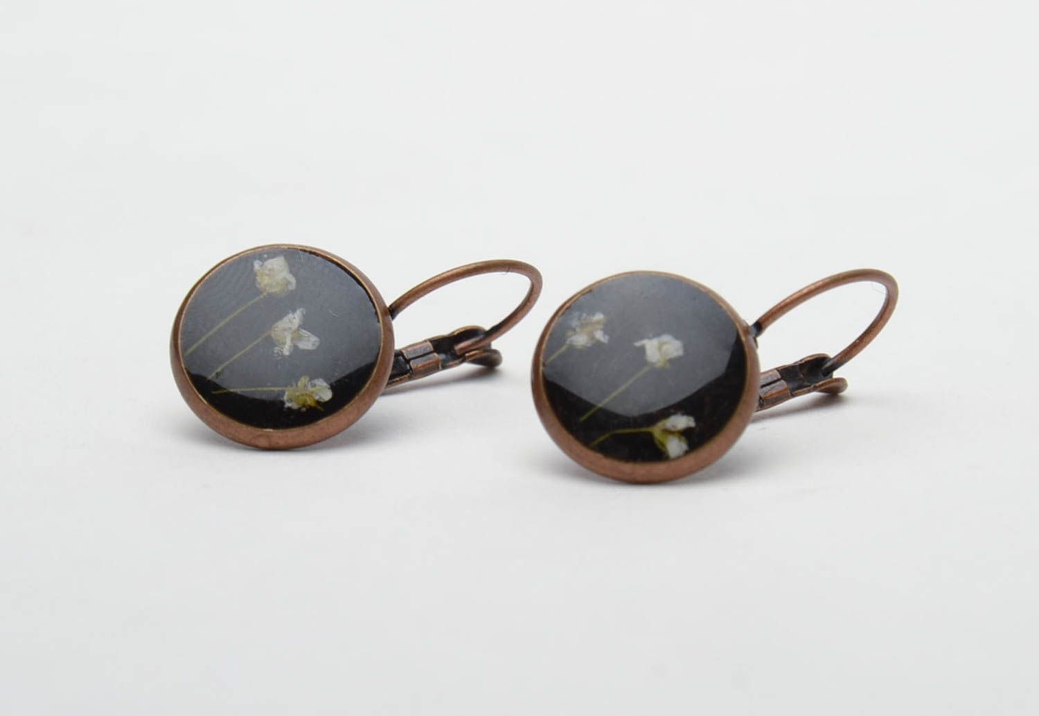 Round black earrings with natural flowers photo 4