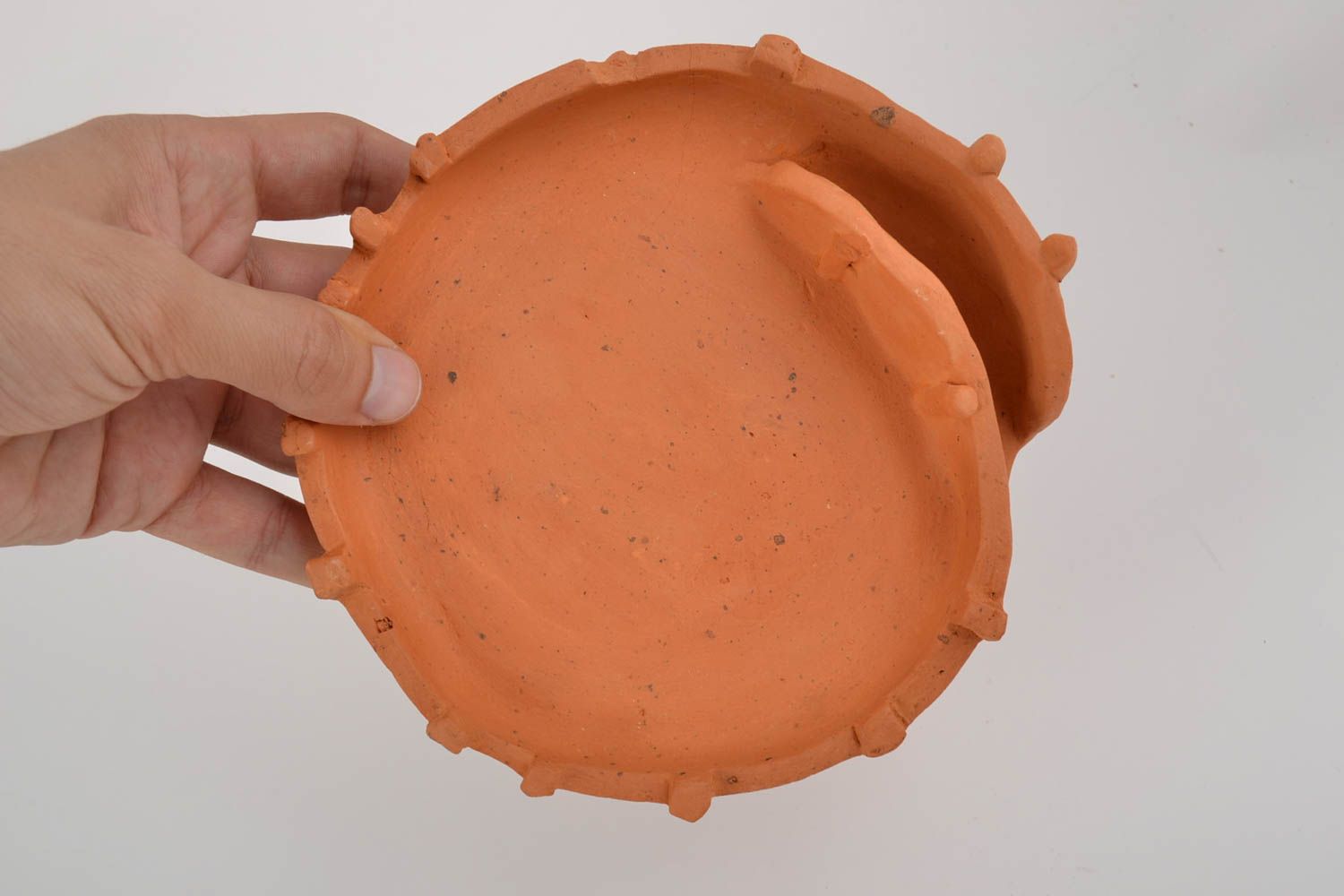 Porte-serviettes de table en céramique fait main marron en forme d'assiette photo 2