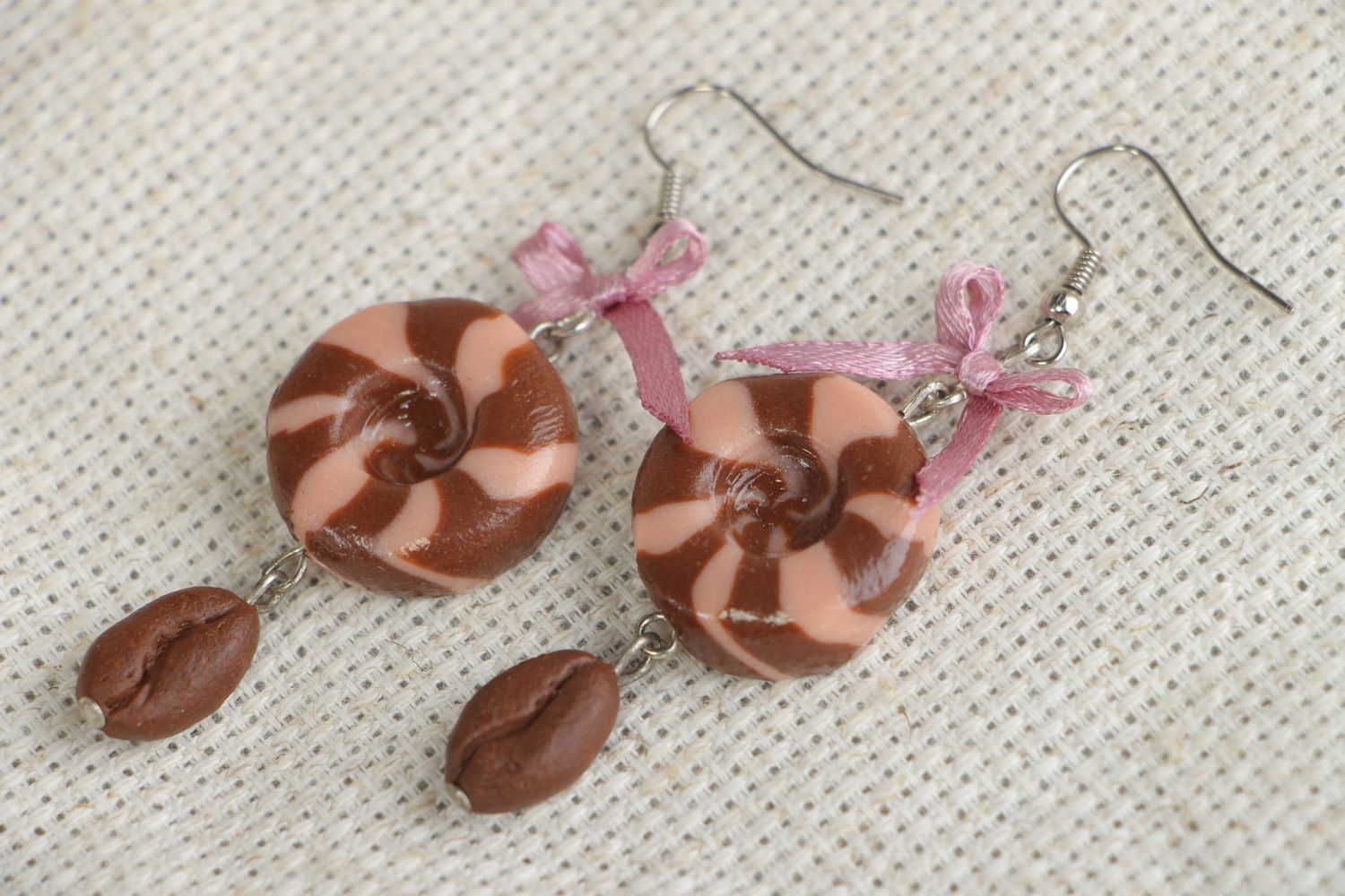 Handmade round dangle earrings made of plastic with satin bows in brown color photo 4