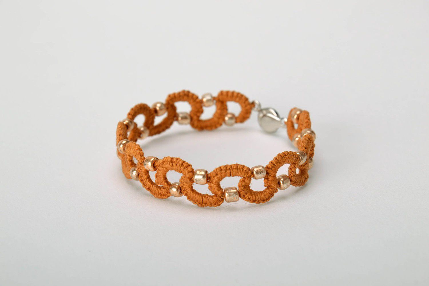 Bracelet braided from cotton threads brown photo 3